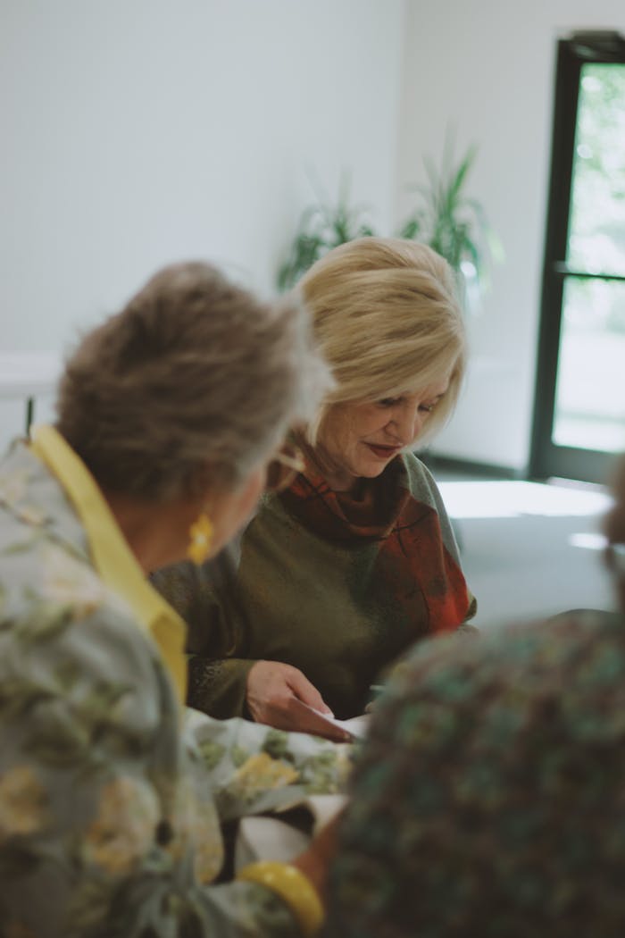 The Art of Drawing Readers In: Your attractive post title goes here Women engaged in a Bible study session at a local church in Brevard, NC.